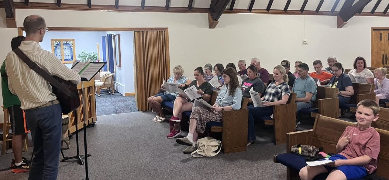 Ecumenical Choir Practicing for Thresher’s Service in Mid- July